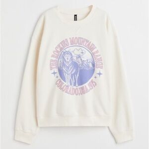 H&M Cream Sweater with Purple Graphic